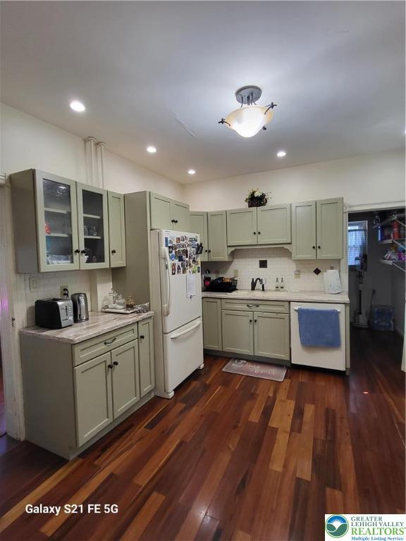 37 6th Street Emmaus, PA 18049 - Photo 7 of 31 a kitchen with stainless steel appliances kitchen island granite countertop a sink cabinets and wooden floor
