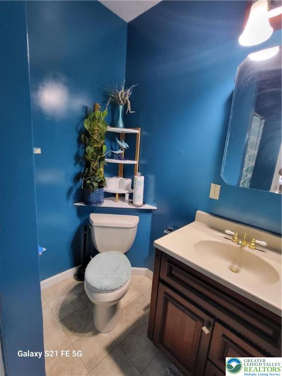 37 6th Street Emmaus, PA 18049 - Photo 9 of 31 a bathroom with a toilet a sink and mirror