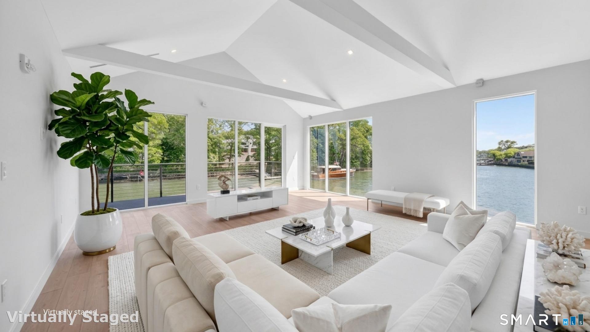 Introducing this stunning waterfront apartment with a balcony. This corner residence is filled with natural light and showcases the gorgeous waterfront views from the kitchen and living area.