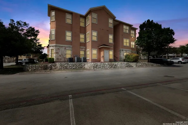 a front view of a building with street view