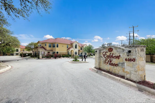a view of street with parked cars