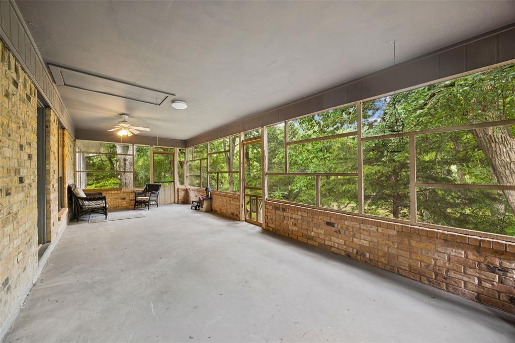 3569 Luella Road Sherman, TX 75090 - Photo 24 of 38 a view of a livingroom with furniture and floor to ceiling window