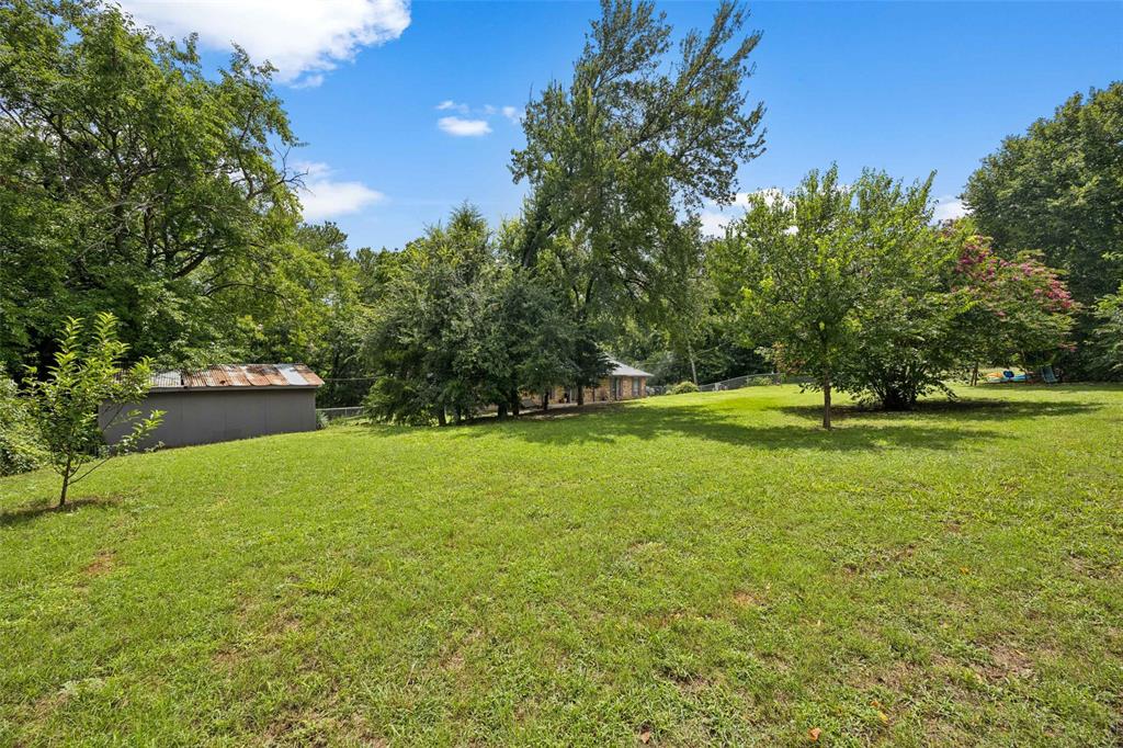 3569 Luella Road Sherman, TX 75090 - Photo 28 of 38 a view of a field of grass and trees