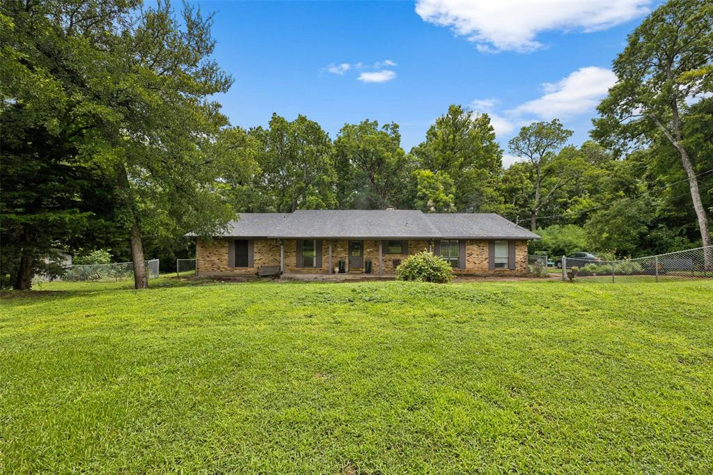 3569 Luella Road Sherman, TX 75090 - Photo 30 of 38 a view of a house with a garden