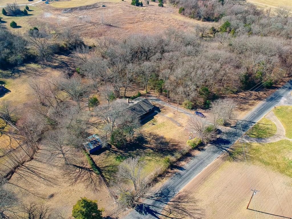 3569 Luella Road Sherman, TX 75090 - Photo 35 of 38 a view of a yard with trees