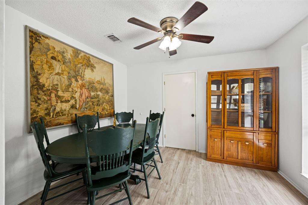 3569 Luella Road Sherman, TX 75090 - Photo 9 of 38 a view of a dining room with furniture window and wooden floor