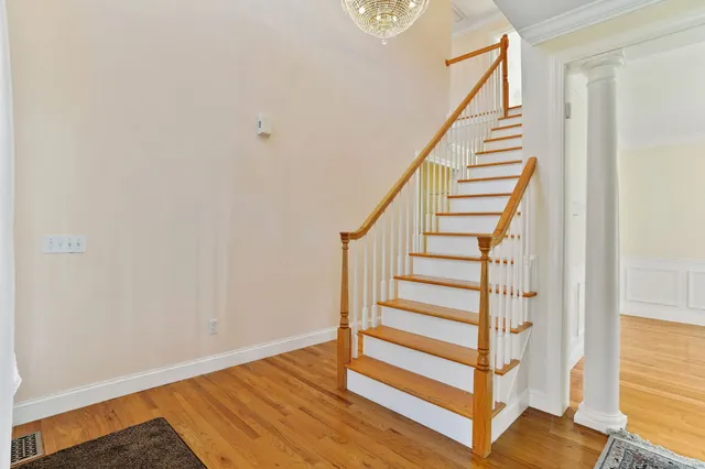 a view of entryway with wooden floor