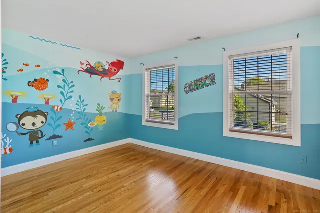 a room with toys and wooden floor