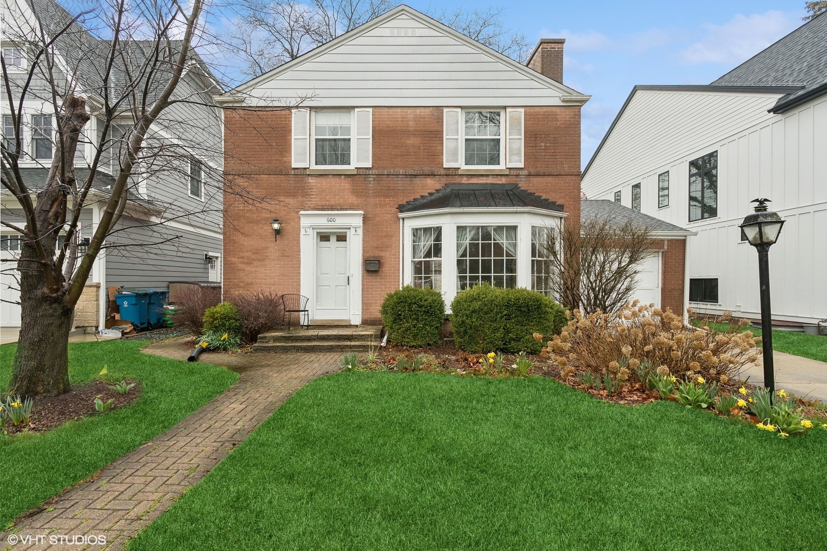 front view of a house with a yard