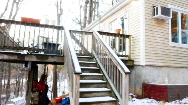 a kitchen with a sink a stove and cabinets
