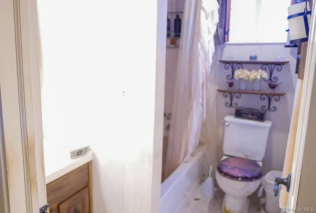 a view of a balcony with furniture