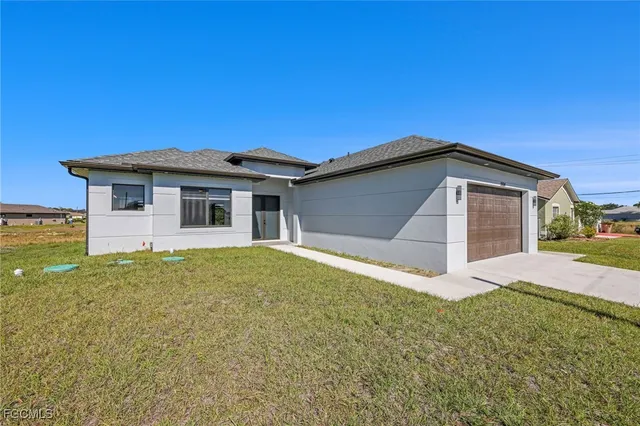 $349,999 | 5504 Beauty Street, Lehigh Acres, FL 33971