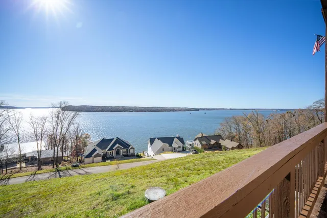 a view of a backyard with sitting area