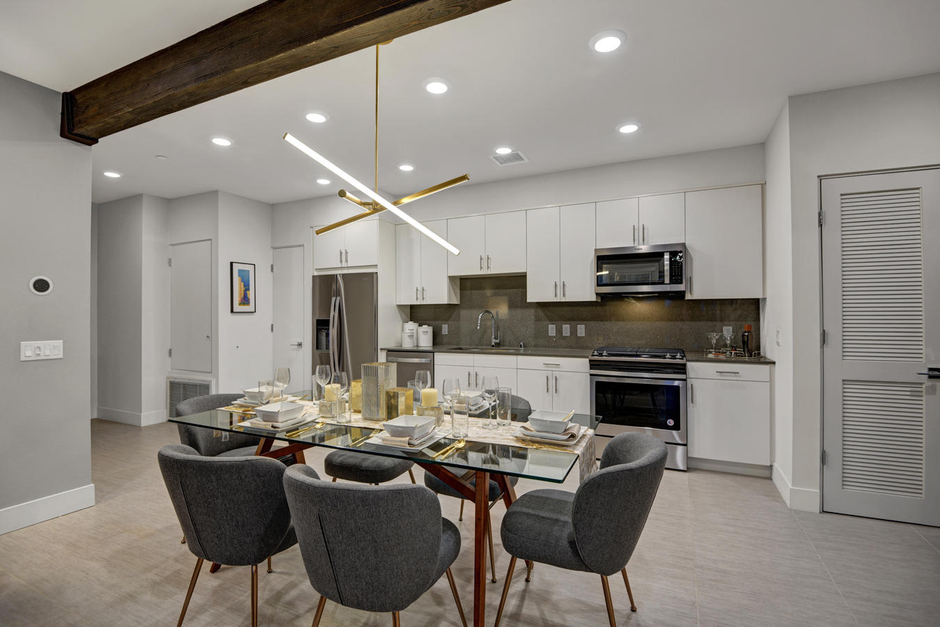 167 The Riv Palm Springs, CA 92262 - Photo 1 of 11 1200-dining-room-to-kitchen-night