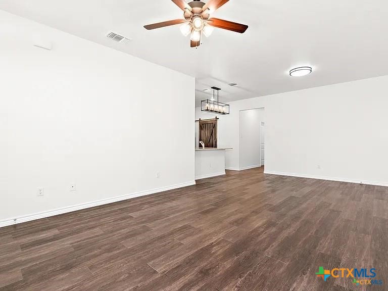 5104 Rose Gdn Loop Killeen, TX 76542 - Photo 10 of 29 a view of a room with wooden floor and ceiling fan
