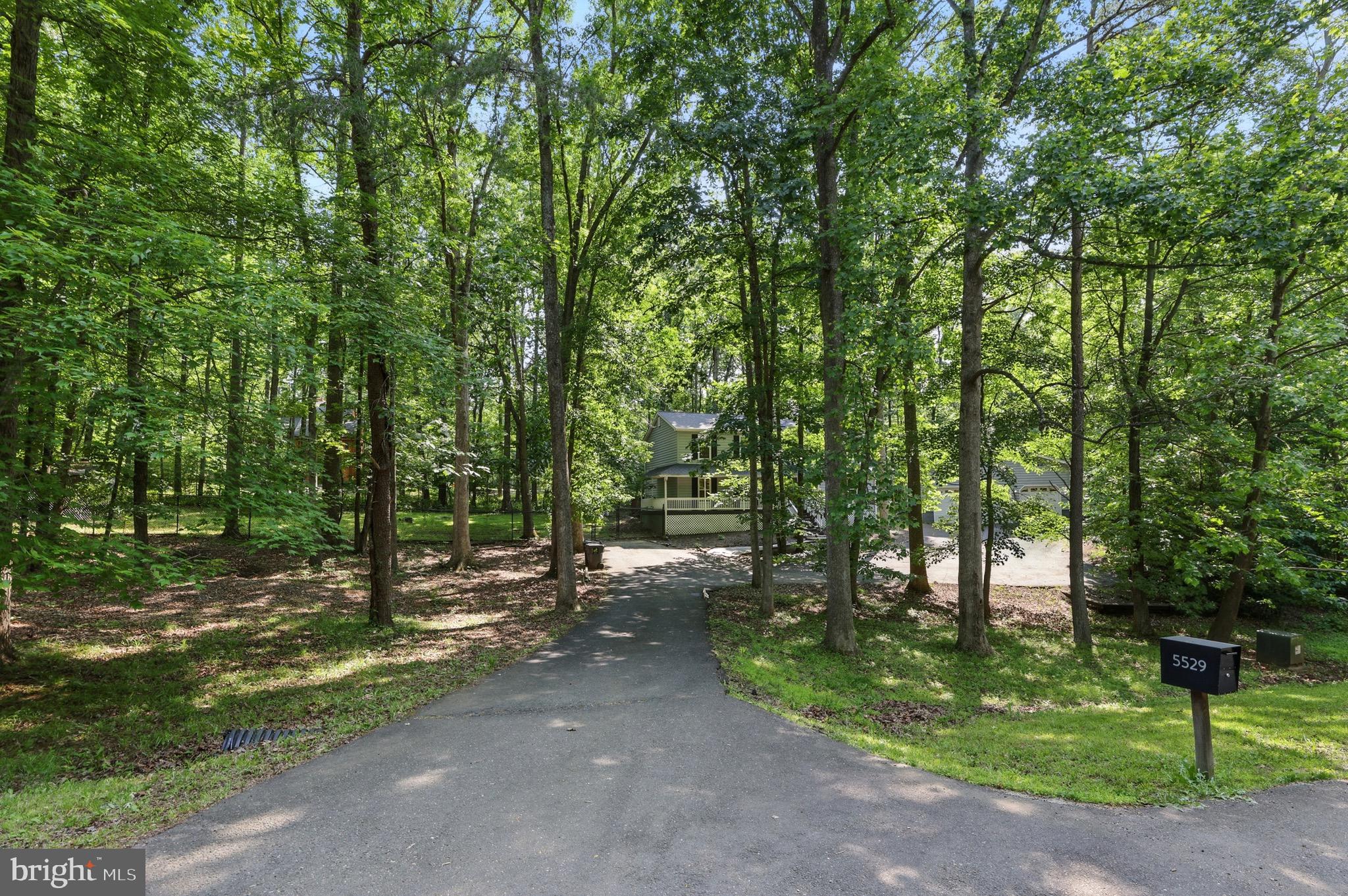 5529 Raider Drive Warrenton, VA 20187 - Photo 33 of 36 Front view of house down the driveway