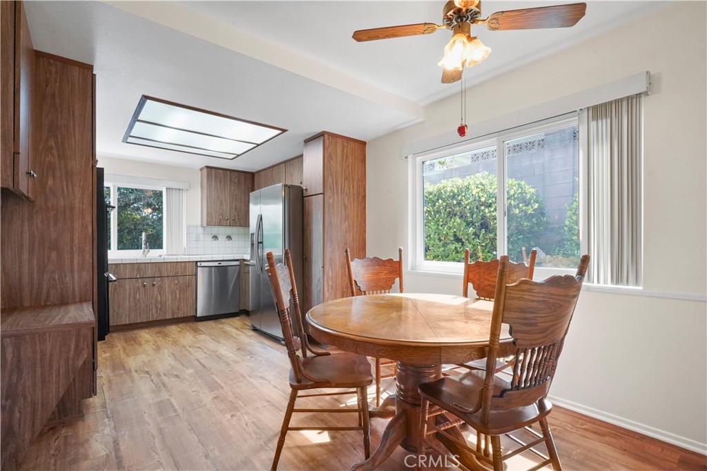 3136 Voltaire Drive Topanga, CA 90290 - Photo 11 of 48 a view of a dining room with furniture window and wooden floor