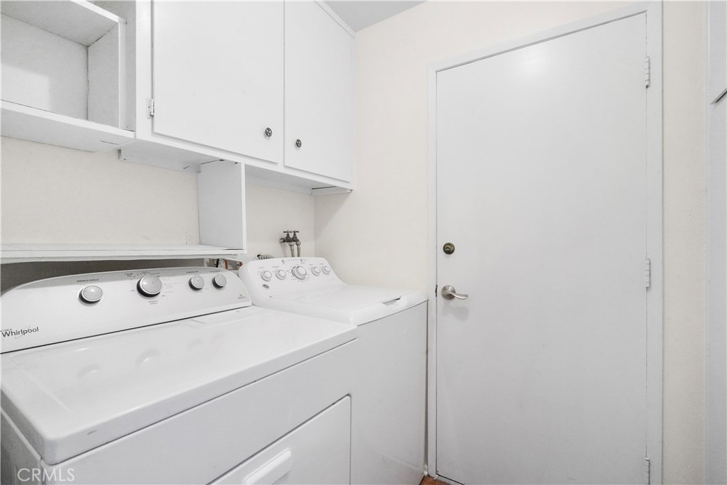 3136 Voltaire Drive Topanga, CA 90290 - Photo 22 of 48 a utility room with dryer and washer