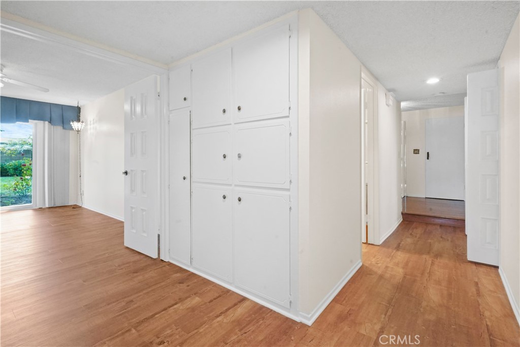 3136 Voltaire Drive Topanga, CA 90290 - Photo 23 of 48 a view of a hallway with wooden floor