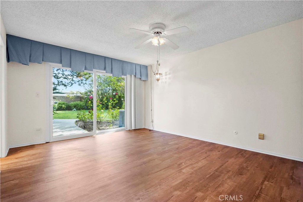 3136 Voltaire Drive Topanga, CA 90290 - Photo 25 of 48 a view of an empty room with wooden floor and a ceiling fan