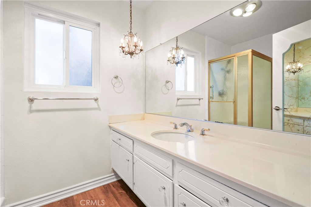 3136 Voltaire Drive Topanga, CA 90290 - Photo 29 of 48 a bathroom with a sink and a mirror
