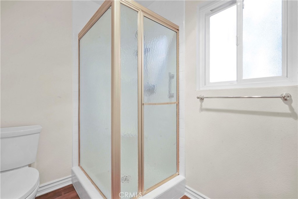 3136 Voltaire Drive Topanga, CA 90290 - Photo 31 of 48 a bathroom with a toilet and a shower