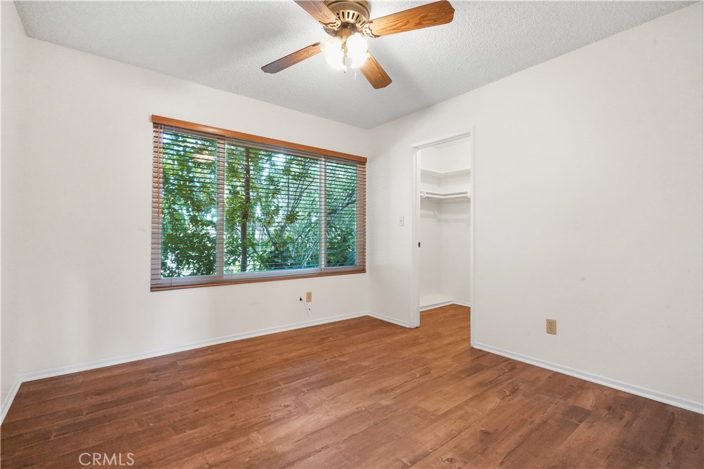 3136 Voltaire Drive Topanga, CA 90290 - Photo 34 of 48 a view of empty room with wooden floor and fan
