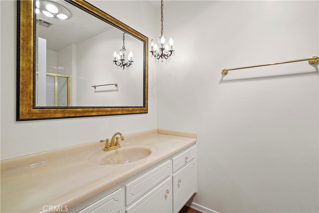 3136 Voltaire Drive Topanga, CA 90290 - Photo 37 of 48 a bathroom with a sink and a mirror