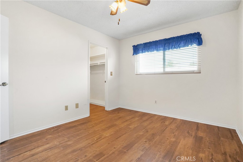 3136 Voltaire Drive Topanga, CA 90290 - Photo 38 of 48 a view of empty room with wooden floor and fan