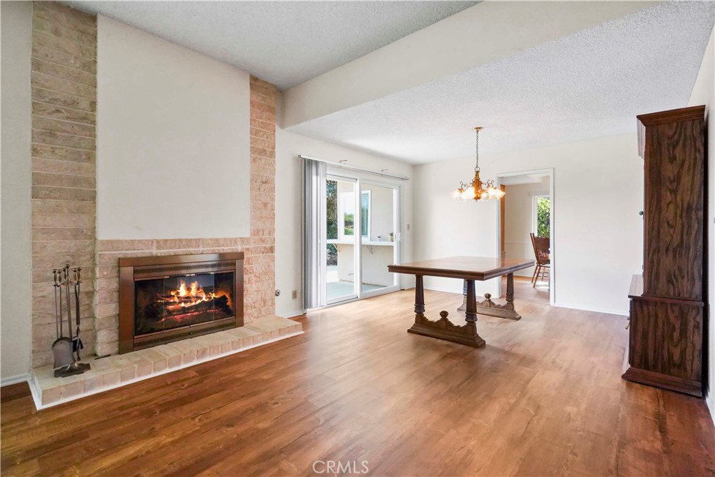 3136 Voltaire Drive Topanga, CA 90290 - Photo 6 of 48 a living room with furniture and a fireplace