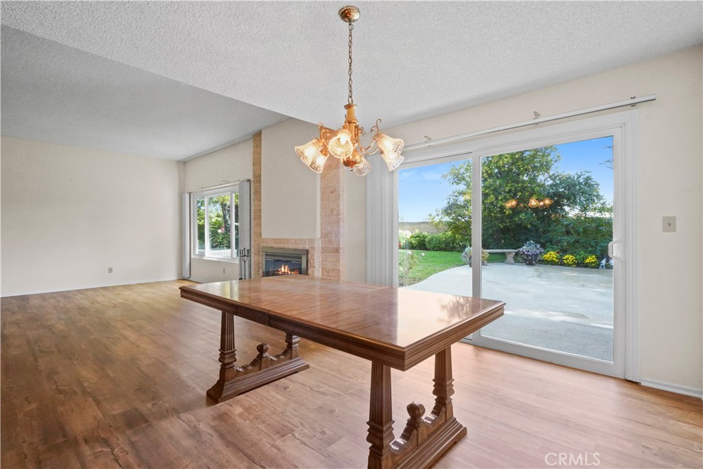 3136 Voltaire Drive Topanga, CA 90290 - Photo 8 of 48 a view of a dining room with furniture window and wooden floor