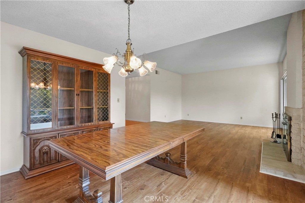 3136 Voltaire Drive Topanga, CA 90290 - Photo 9 of 48 a view of a room with wooden floor chandelier and windows
