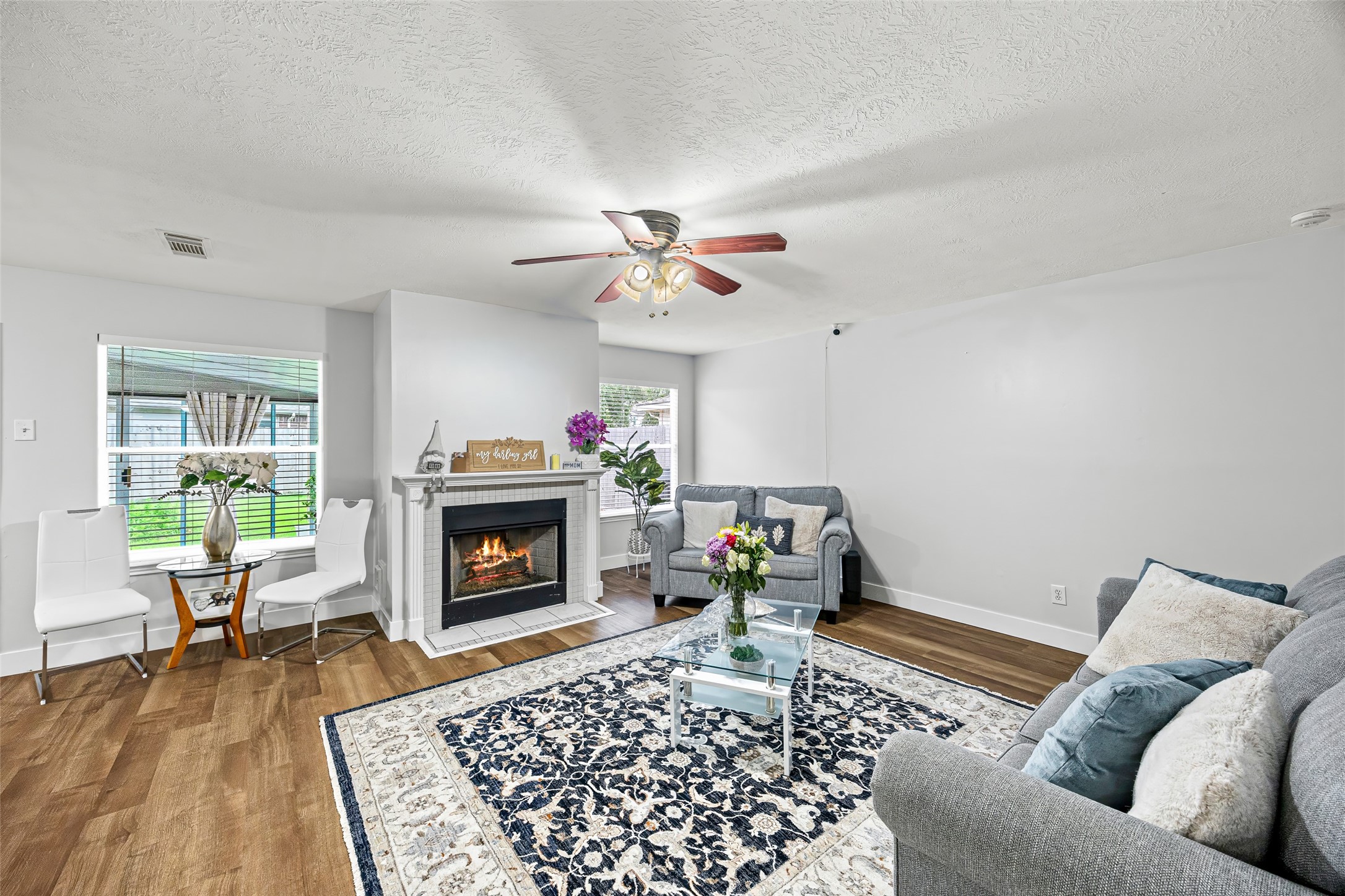 2710 Fox View Circle Spring, TX 77386 - Photo 11 of 29 a living room with furniture and a fireplace