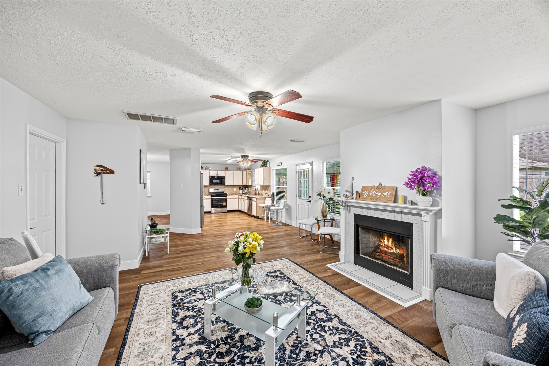 2710 Fox View Circle Spring, TX 77386 - Photo 12 of 29 a living room with furniture and a fireplace