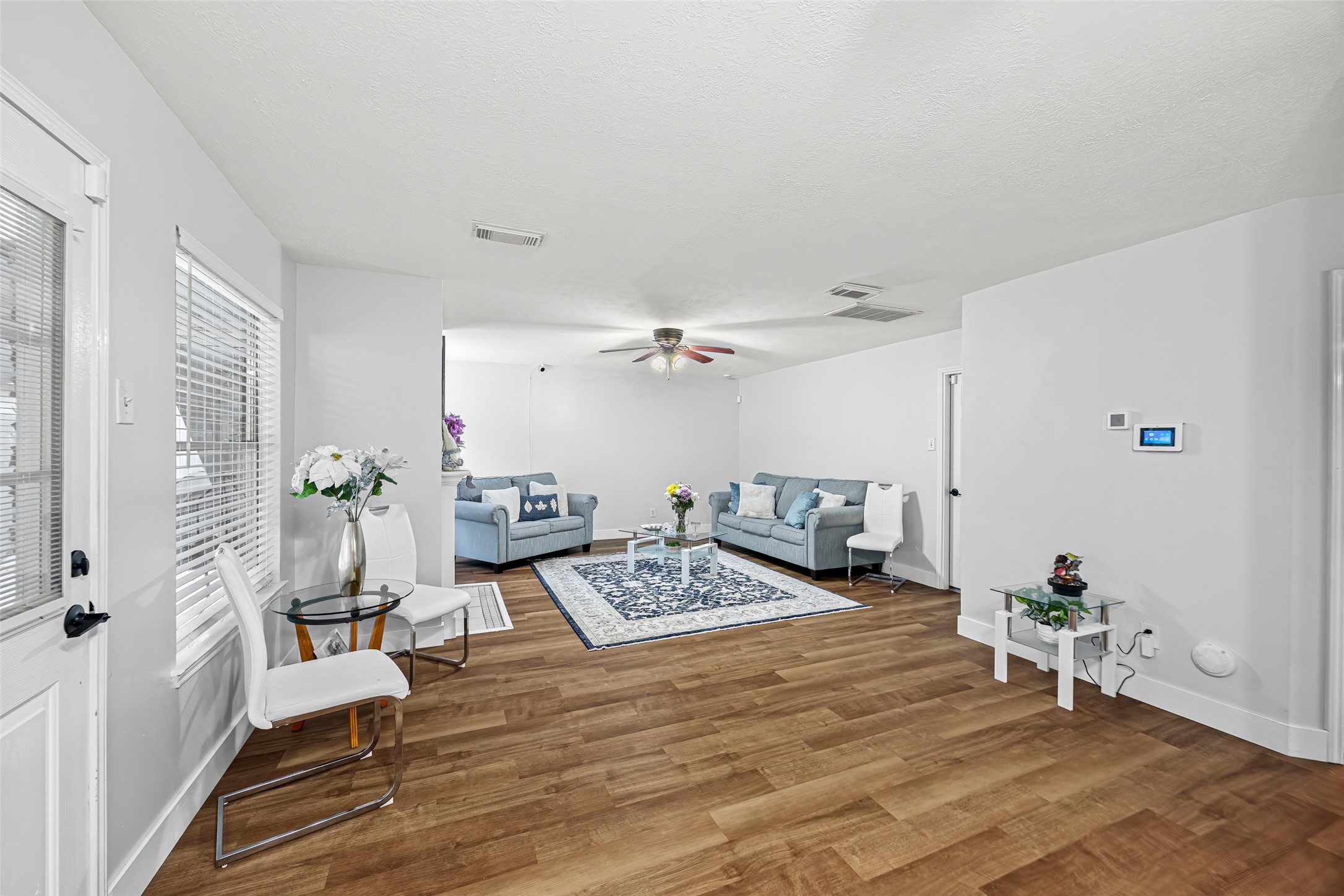 2710 Fox View Circle Spring, TX 77386 - Photo 13 of 29 a living room with furniture and wooden floor