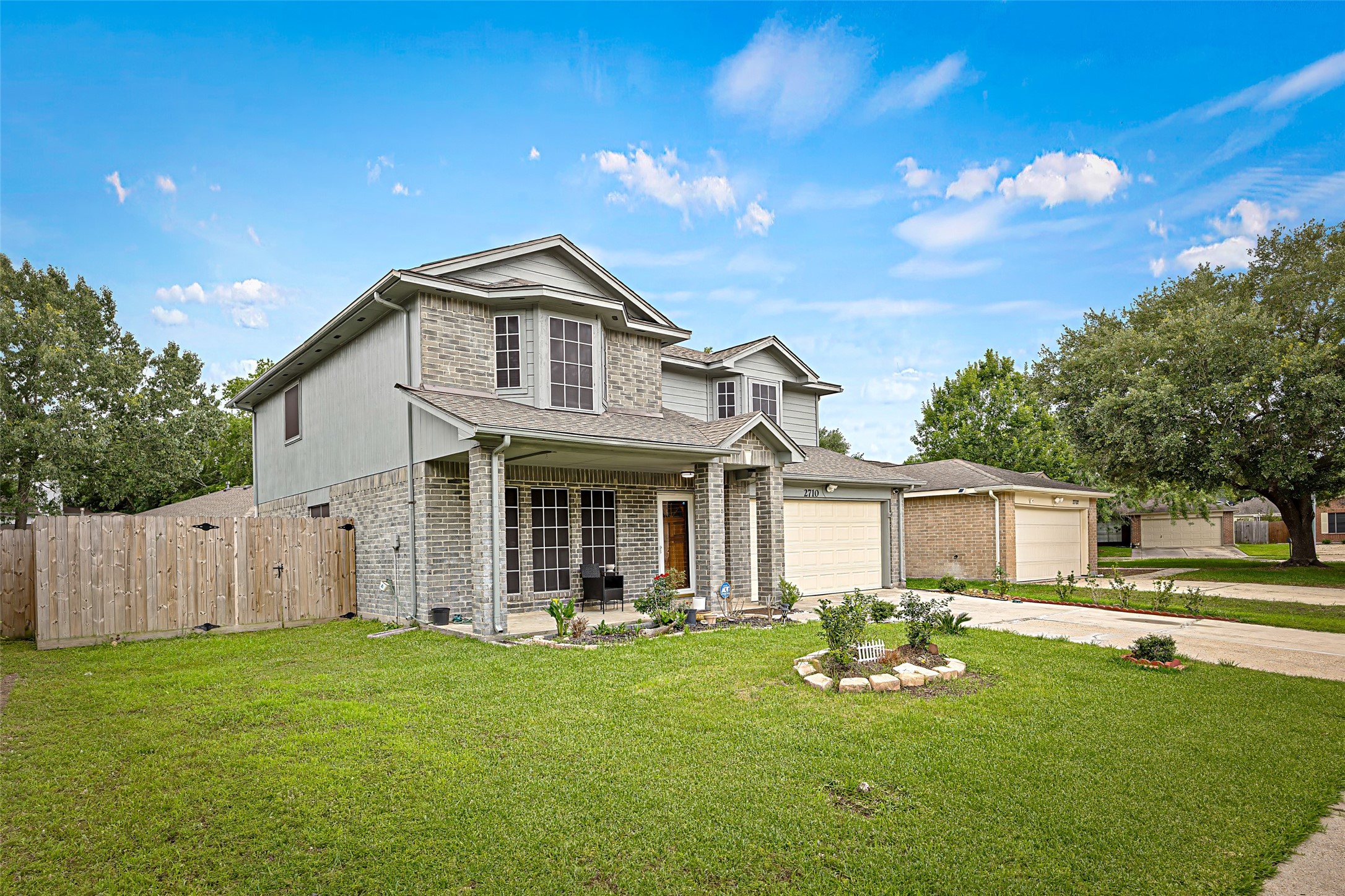 2710 Fox View Circle Spring, TX 77386 - Photo 2 of 29 a front view of a house with garden