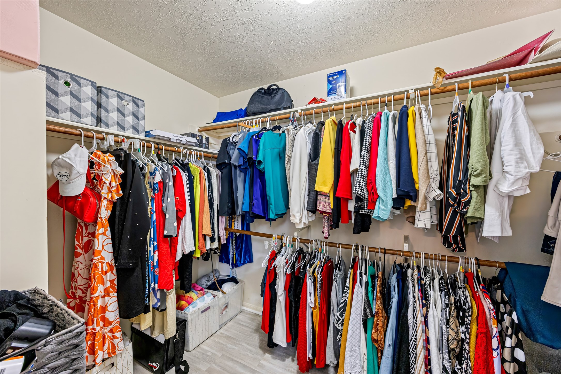 2710 Fox View Circle Spring, TX 77386 - Photo 22 of 29 a view of walk in closet with clothes
