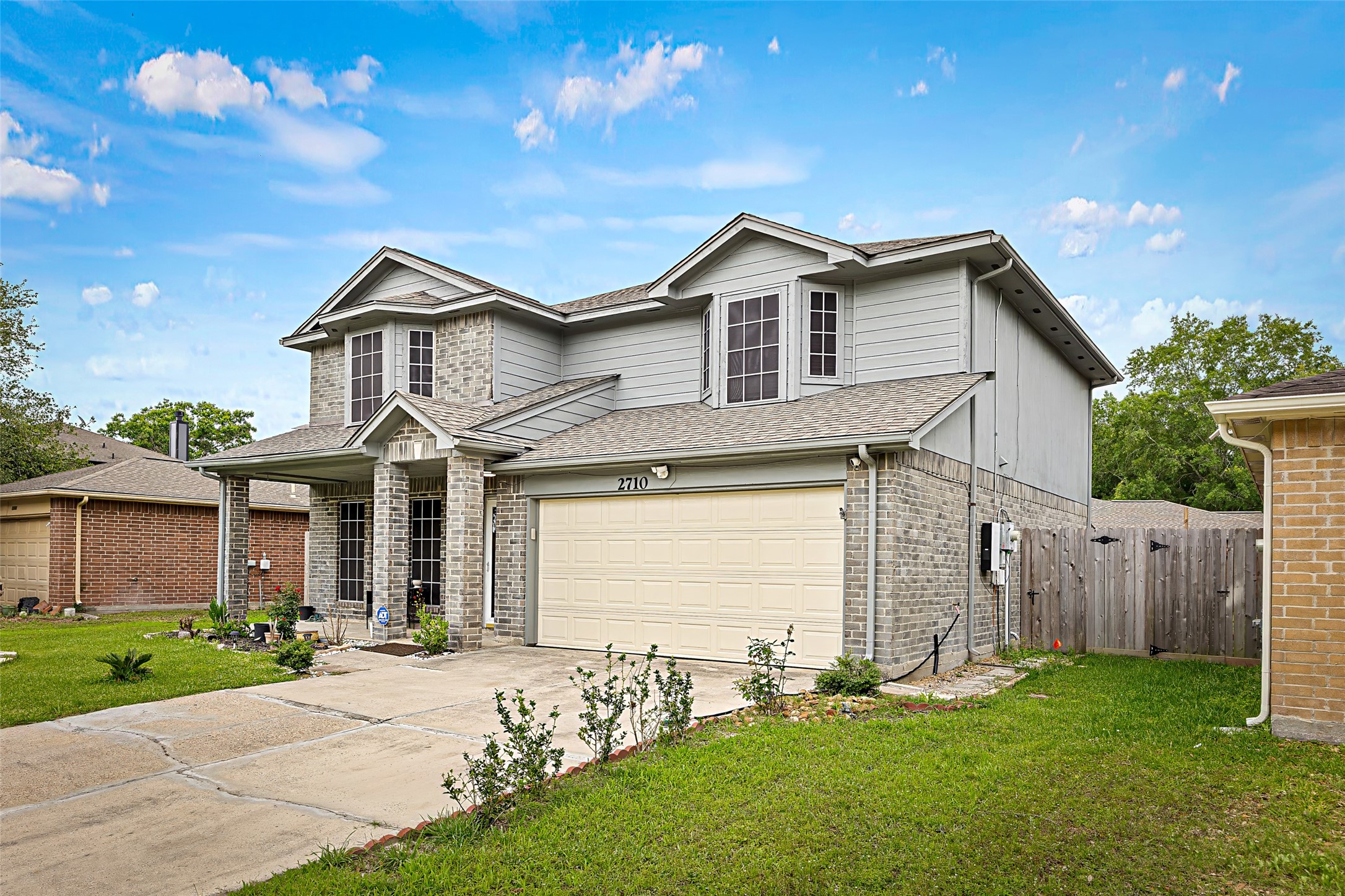 2710 Fox View Circle Spring, TX 77386 - Photo 3 of 29 a front view of house with yard and green space