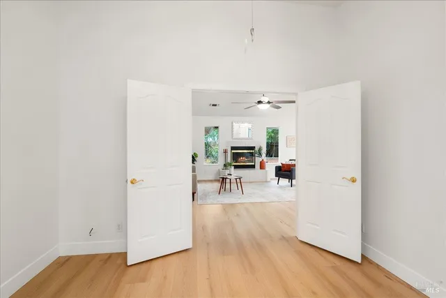 a kitchen with refrigerator a stove a microwave and cabinets