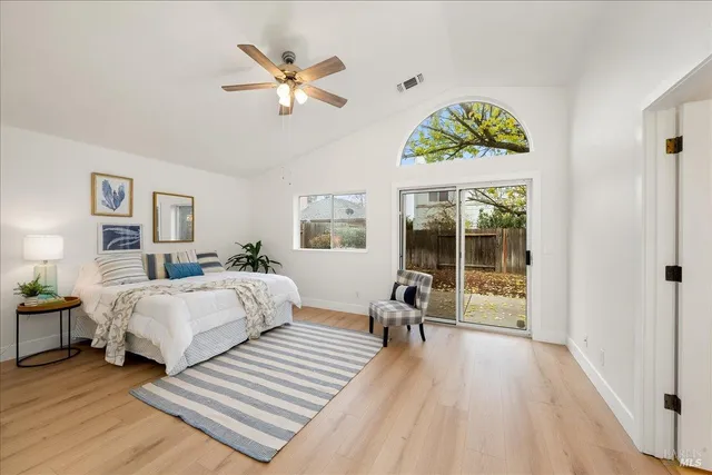 a view of living room with granite countertop furniture and wooden floor