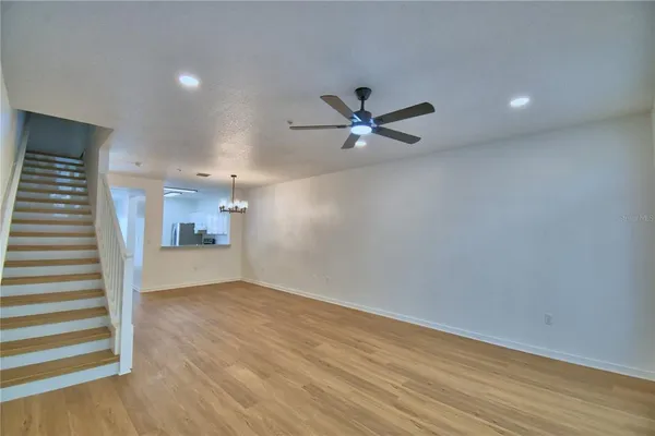 a view of a hallway with a window