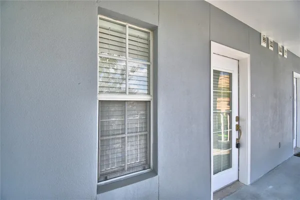 a bathroom with a toilet a sink and a shower