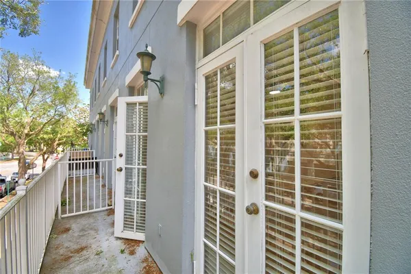 a view of a lake with palm trees