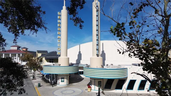 a view of a swimming pool with a yard