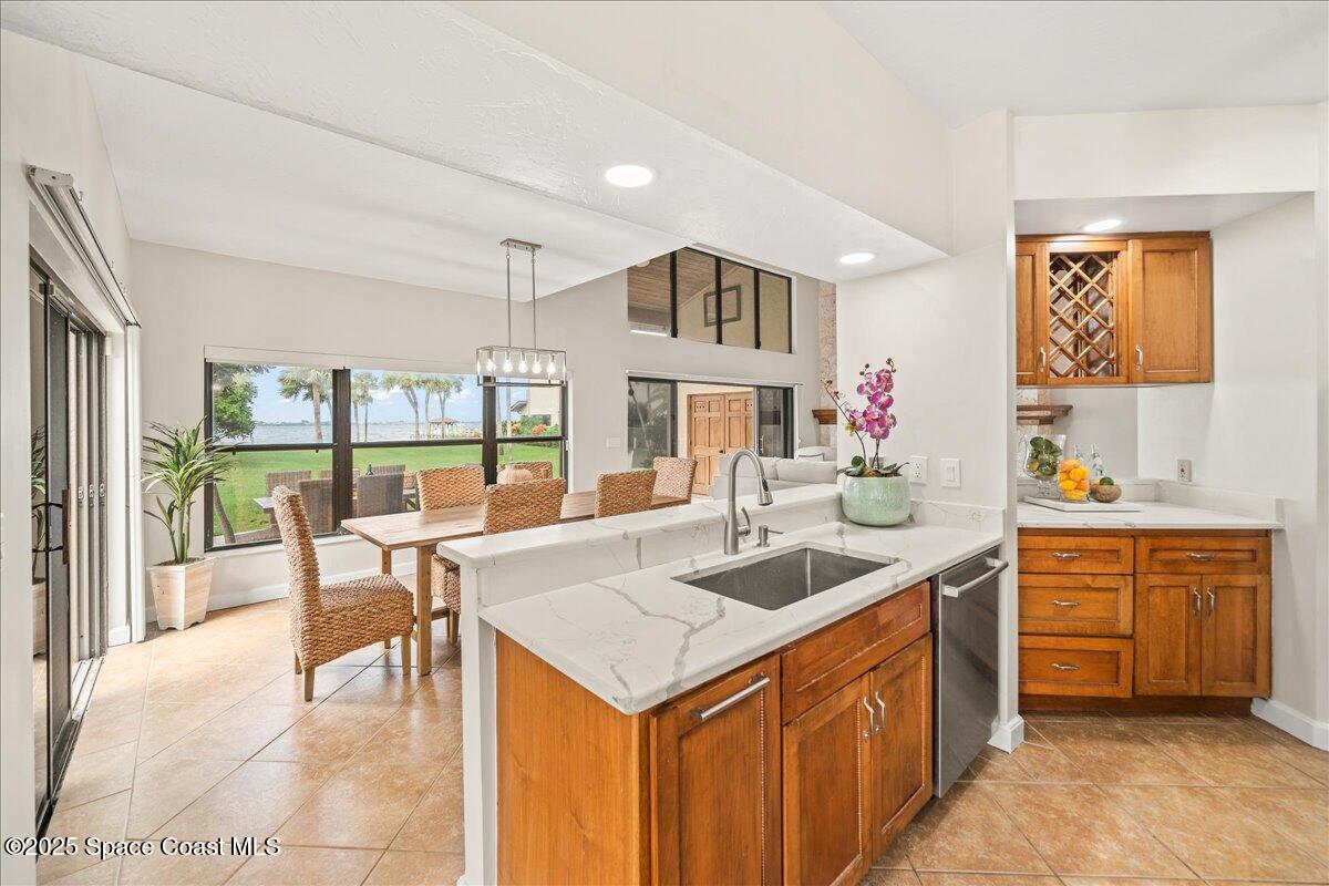208 The Road, Unit C2 Melbourne Beach, FL 32951 - Photo 12 of 65 Views of the river from the sink