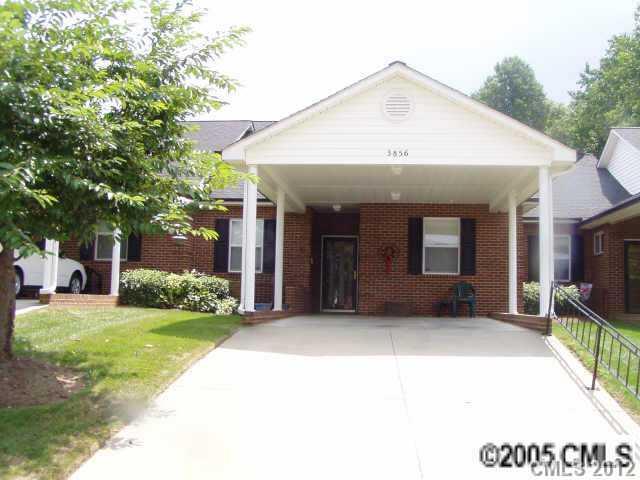 3856 Azalea Trail Denver, NC 28037 - Photo 1 of 15 a front view of a house with a yard and garage