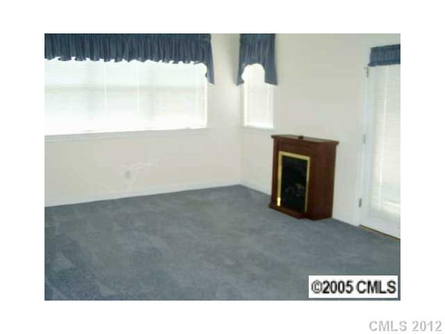 3856 Azalea Trail Denver, NC 28037 - Photo 3 of 15 a view of an empty room with a window