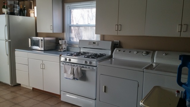 21W162 Coronet Road Lombard, IL 60148 - Photo 14 of 15 a kitchen with a stove and a refrigerator