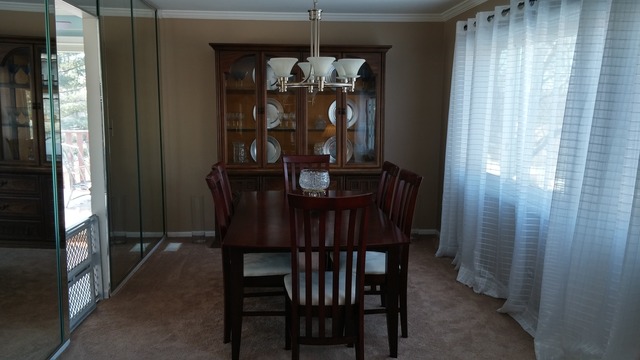 21W162 Coronet Road Lombard, IL 60148 - Photo 9 of 15 a dining room with furniture and window