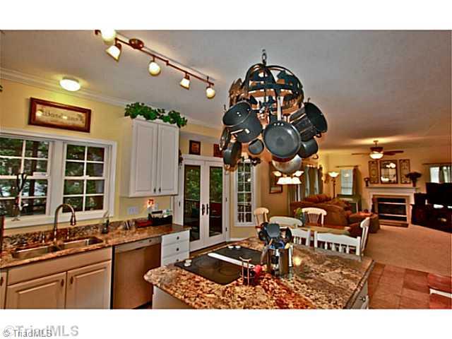 6309 High View Road Greensboro, NC 27410 - Photo 5 of 16 Kitchen. Everyone can be together open up the french doors and enlarge your living area with the great outdoor living area.